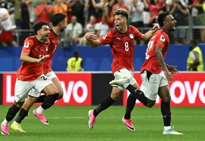 Selebrasi pemain Mesir setelah mencetak gol ke gawang Australia